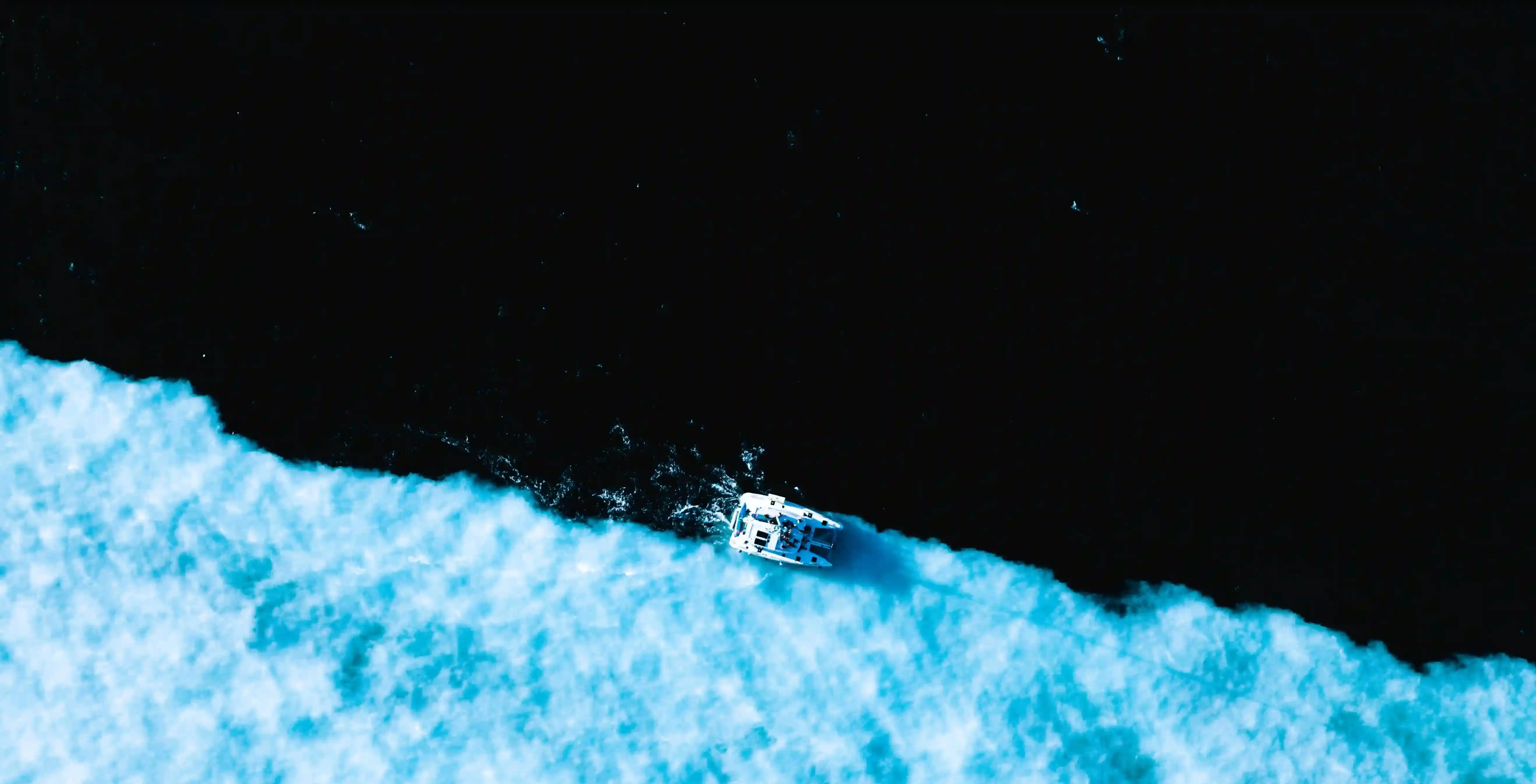 Vessel breacking through ice representing disruptive AI technology for LegalCyborg homepage